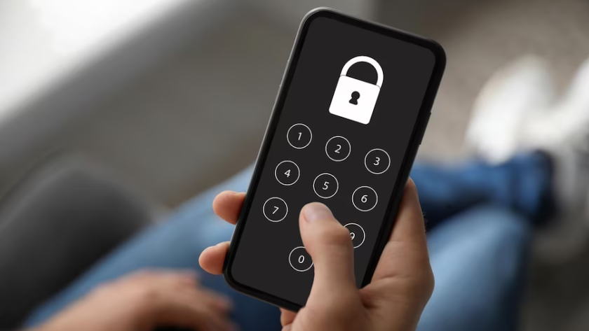 Phone with number pad and padlock icon on screen